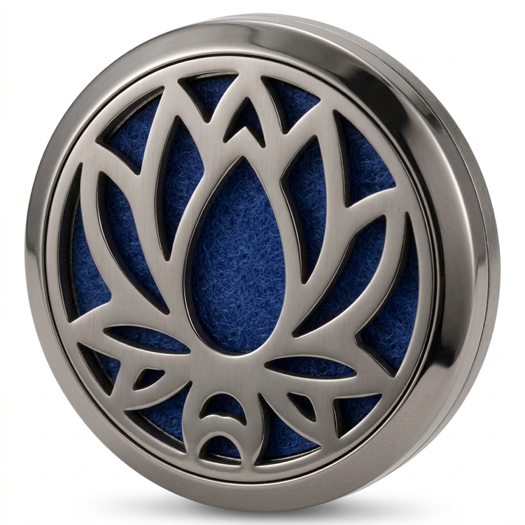 Silver Lotus Flower car vent clip with blue felt on a white background