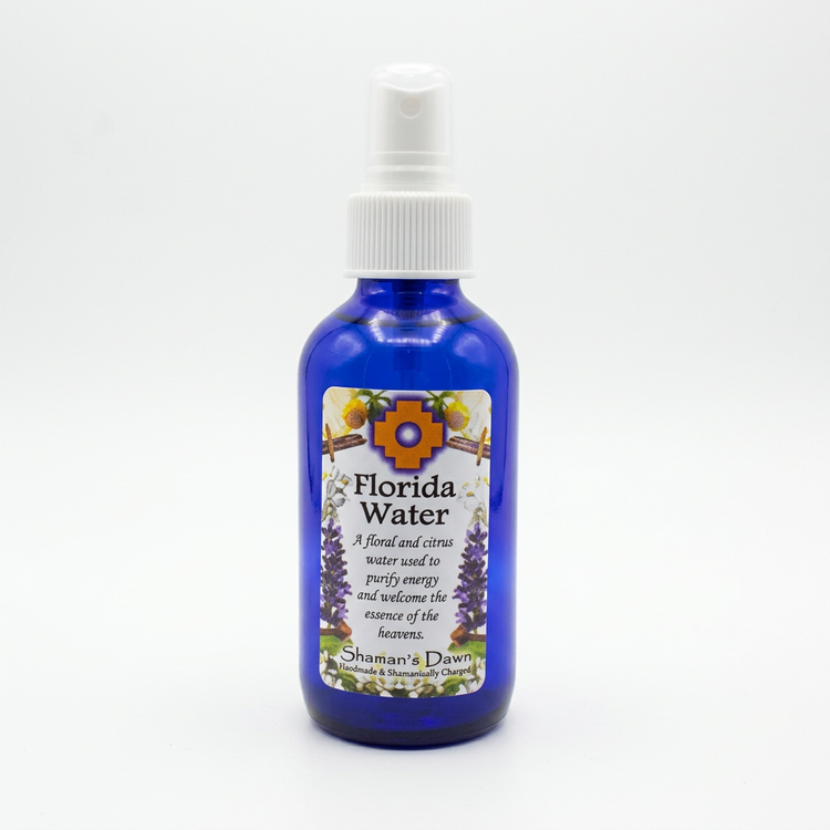 Florida Water Spray blue bottle with white spray pump on a clean white background