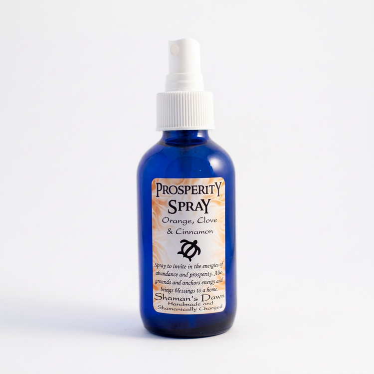 Prosperity Spray blue bottle with white spray pump on a clean white background